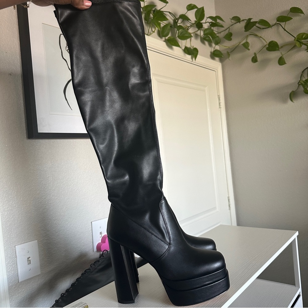Pull on over the knee black boots